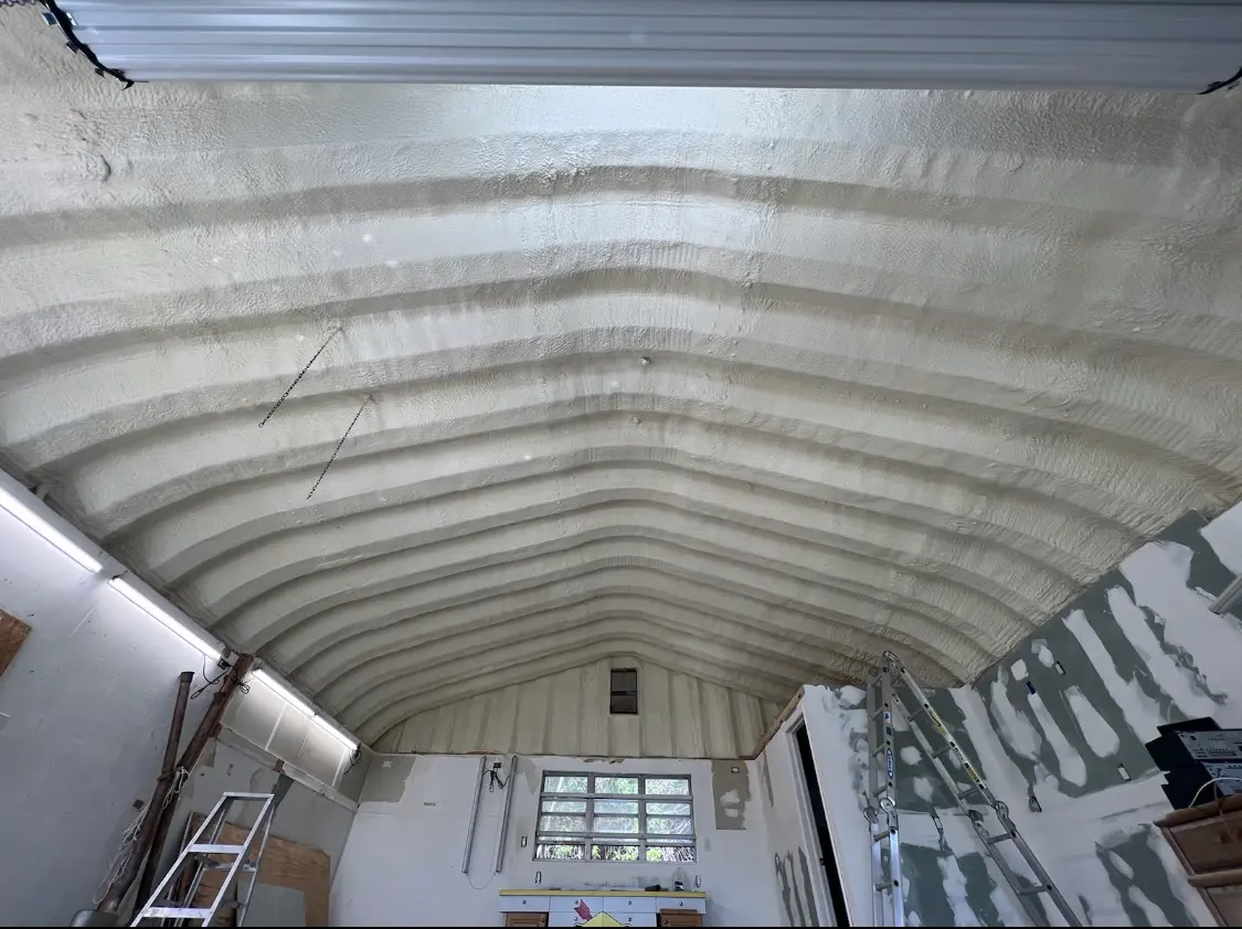 Spray polyurethane foam applied to the underside of a metal roof deck in Biloxi